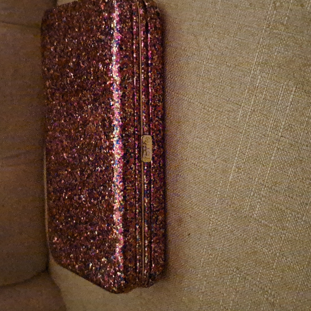 Im selling a tarte Glitter Pink Wallet Box Clutch